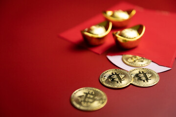 Pile of bitcoin in red envelope with old chinese money. concept of digital chinese new year celebration and crypto currency. closeup.