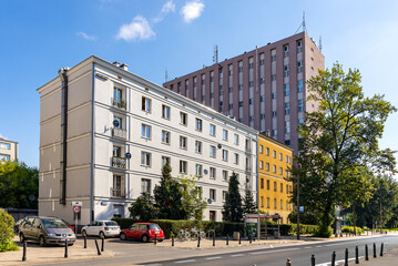 Panoramic view of Madalinskiego street tenement residential houses with Kazimierzowska Orange Polska data center in Mokotow district of Warsaw in Poland © Art Media Factory