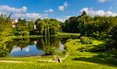 Morskie Oko pond park below Pulawska and Dworkowa street in Mokotow district with Srodmiescie downtown view of Warsaw in Poland - obrazy, fototapety, plakaty