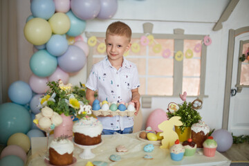 happy easter. happy funny boy playing with Easter objects.