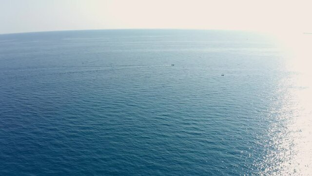 Flight motion over the sea.  Ligurian coast.  Destination summer vacation. Aerial view.
