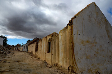 Burned remains of dwellings after a devastating fire in the village of Wupperthal