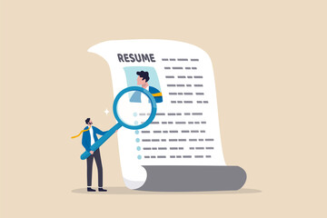 Candidate resume review by HR human resources hiring manager, employment or searching for talent and new staff concept, smart businessman hiring manager using magnifying glass tor review resume.