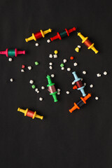 Spool with colourful thread or manjha or dark background. Indian festival makar sankranti concept