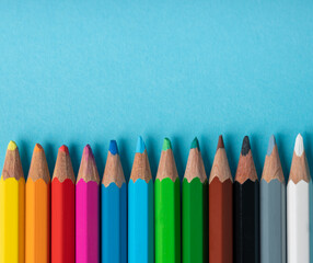 crayons on a blue background