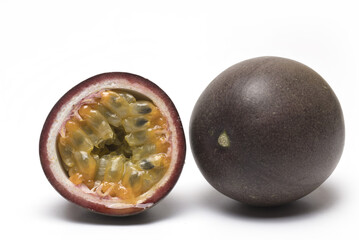 Closeup passion fruit cut half white background