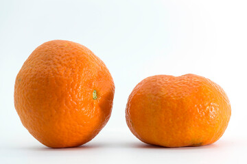 two tangerines on white background