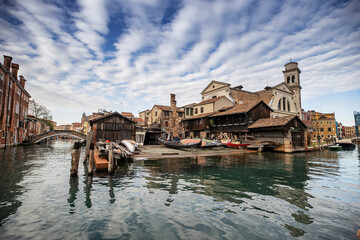 Island murano in Venice Italy. View on canal with boat and motorboat water. Picturesque landscape.