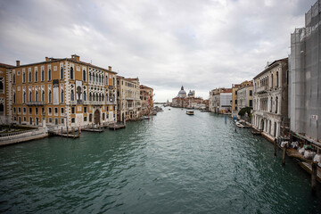 Fototapeta na wymiar Island murano in Venice Italy. View on canal with boat and motorboat water. Picturesque landscape.