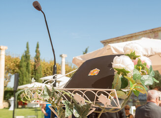 Heraldic design of the national coat of arms of Spain on the cover of a notebook that is on a...