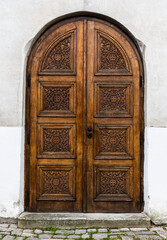 Old wooden church door. Medieval door.