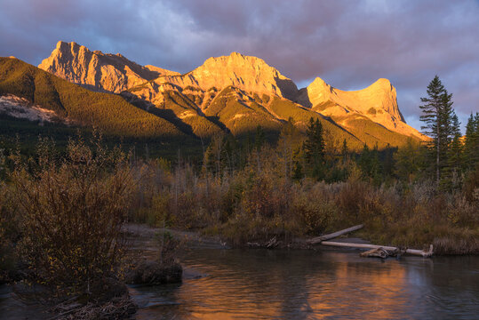 Colourful Sunrise over Ha Ling Peak and Mount Lawrence Grassi in autumn, Canmore, Banff, Alberta, Canadian Rockies, Canada