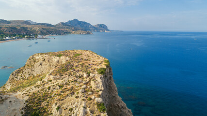 The small bay with crystal clear waters and rocky surroundings on the island of Rhodes,Greece