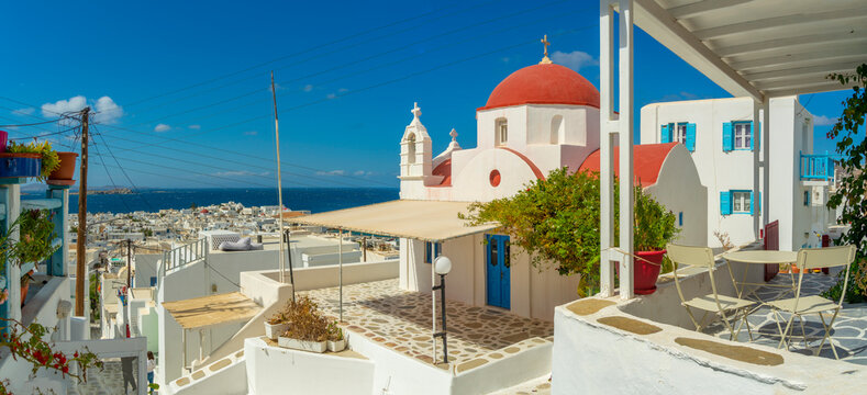Fototapeta View of narrow street and red domed chapel overlooking Aegean Sea, Mykonos Town, Mykonos, Cyclades Islands, Greek Islands, Aegean Sea