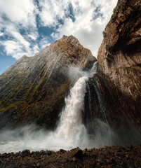A picturesque waterfall made of rock. Caucasus. The Republic of Kabardino-Balkaria, the Elbrus region, Jily-Su. Karakaya-su Waterfall.