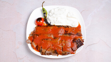 Iskender beef doner kebab with french fries isolated