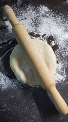 cooking process, modeling, recipe, dough, roll out with a wooden rolling pin, flour