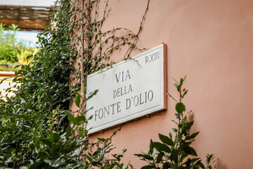 Wall sign with the name of Via della Fonte d'Olio (in English translation - Oil Fountain Street in the 13th district of Rome)