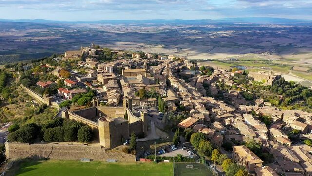 View of Montalcino town in Val d'Orcia, Tuscany, Italy. The town takes its name from a variety of oak tree that once covered the terrain. View of the medieval Italian town of Montalcino. Tuscany