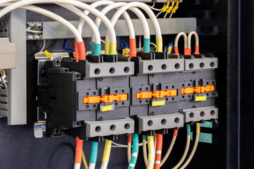 Electrical panel with many wires, electrical parts, automatic switches, breakers, residual current...