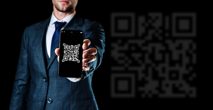 Scan qrcode. Digital mobile smart phone with qr code scanner on smartphone screen for payment, online pay, scan barcode technology man holding. Retail shop accepted digital pay without money.