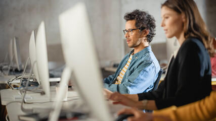Smart Young Students Studying in University with Diverse Multiethnic Classmates. Scholars...