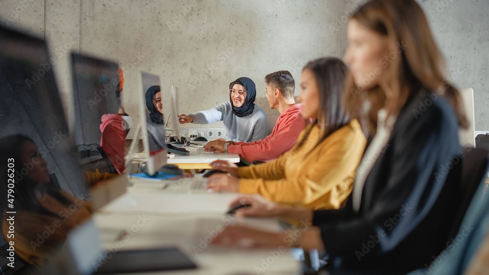 Aufkleber Smart Young Students Studying in University with Diverse Multiethnic Classmates. Scholars Collaborate in College Room with Computers. Applying Knowledge to Acquire Academic Skills in Class.