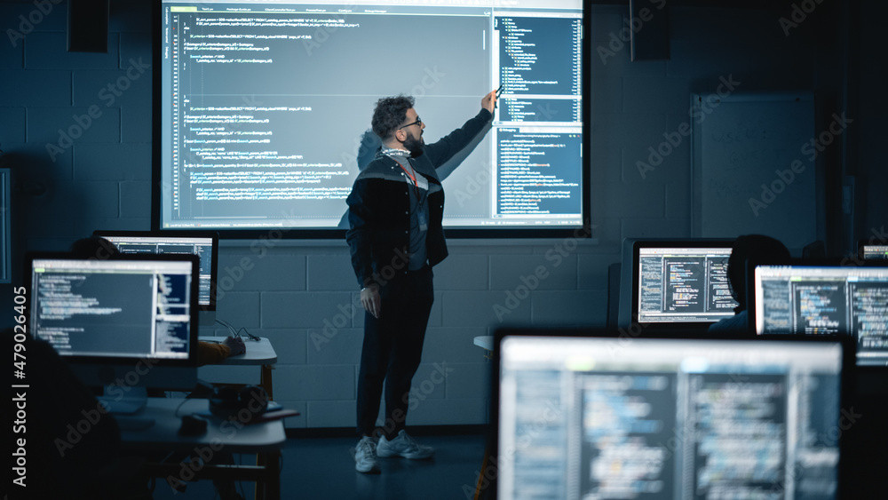 Aufkleber Teacher Giving Computer Science Lecture to Diverse Multiethnic Group of Female and Male Students in Dark College Room. Projecting Slideshow with Programming Code. Explaining Information Technology.