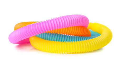 Different colorful Pop Tubes on white background