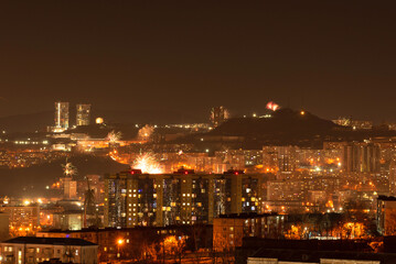 Fireworks in the city at night during New Year celebration. Soft focus background