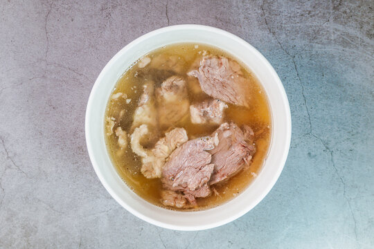Galbitang, Korean style beef Short Rib Soup : Beef ribs, soaked in cold water to remove the blood, and white radish chunks simmered together until tender. The clear stock is rich and savory, and the t