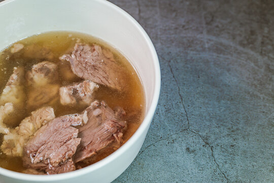 Galbitang, Korean style beef Short Rib Soup : Beef ribs, soaked in cold water to remove the blood, and white radish chunks simmered together until tender. The clear stock is rich and savory, and the t