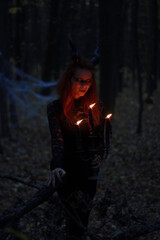 Naklejka premium witch in the dark forest