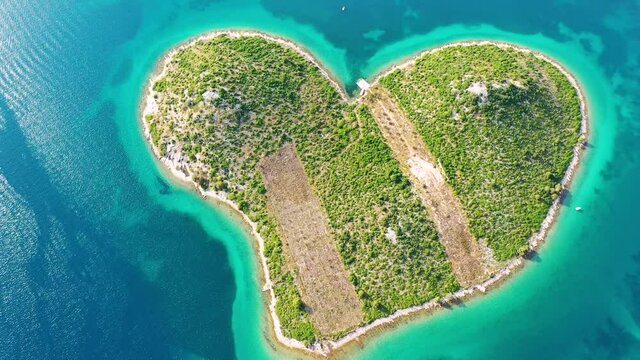Aerial view of the heart shaped Galesnjak island on the adriatic coast, Zadar, Croatia. Heart shaped island of Galesnjak in Zadar archipelago aerial view, Dalmatia region of Croatia.
