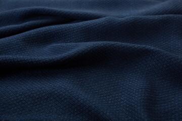 Close up of texture of hand woven shawl, Thai cotton indigo dyed