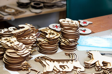 Eco-Friendly Wooden Toy Blank Sets in Carpentry Craft Workshop. Background with Wooden Christmas Toys.