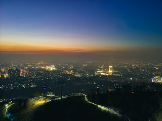Fototapeta na wymiar Night view from Kok Tobe Mountain to the city of Almaty
