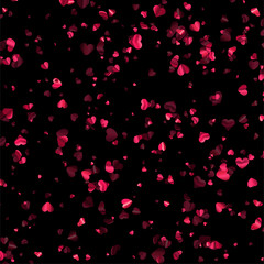 Fototapeta na wymiar Pink foil hearts confetti on black background.