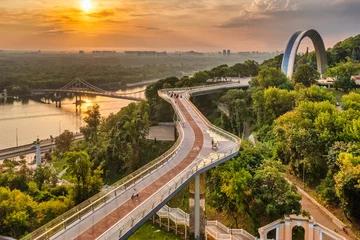 Foto op Canvas Pedestrian and bicycle bridge in Kiev at sunrise, aerial view. © Volodymyr