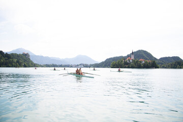 Fototapeta na wymiar Rowing regatta on lake Bled
