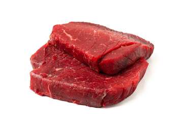 Raw beef steaks isolated on white background
