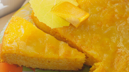 Sweet orange pumpkin baked pie in autumn