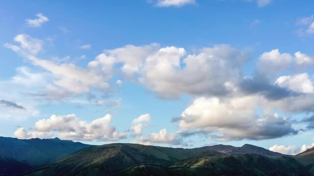 Aerial footage of mountain and beautiful clouds landscape at sunrise