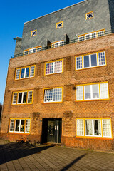 Facade of an ornate apartment building in the Amsterdamse School style in Amsterdam Zuid, The Netherlands, Europe