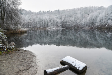 Winter lake landscape. Szmaragdowe lake in Szczecin, Poland in winter.
