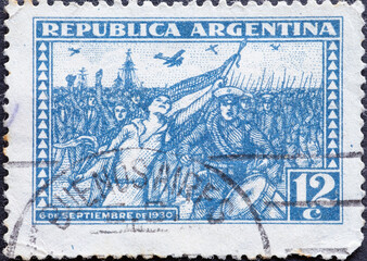 Argentina - circa 1930: A post stamp from the Argentina showing soldiers and a flag bearer. The...