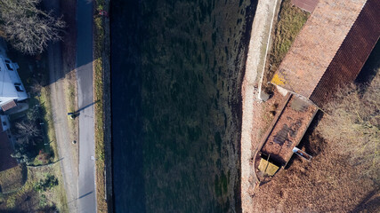A Historical Barge Docked Along The Naviglio Grande In Castelletto Di Cuggiono, Italy