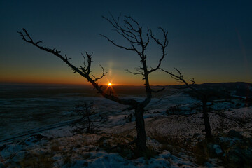 Last rays of winter sunset