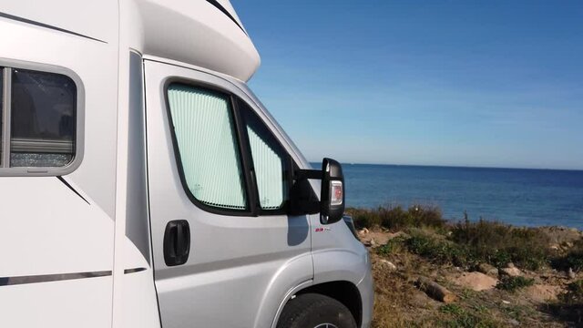 Free camping with camper van in the beach near te sea in Murcia , La Manga Alicante Spain - travel during Covid-19 Coronavirus epidemic
