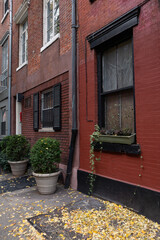 Old Brick Residential Buildings along the Sidewalk during the Fall in the East Village of New York City